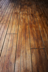 close-up image of aged wooden floor in building