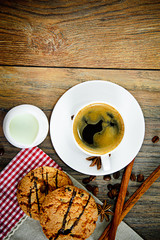 Coffee with Bakery on Woody Retro Background