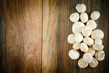 Fototapeta na wymiar Mushrooms on a Wooden Board