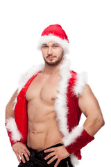 Sexy male posing in xmas costume, isolated on white