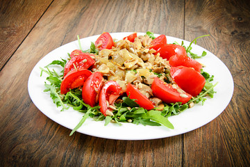 Salad with Tomatoes, Mushrooms, Arugula and Sunflower Seeds