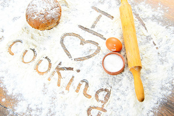 Obraz na płótnie Canvas I Love Cooking Sign on Flour