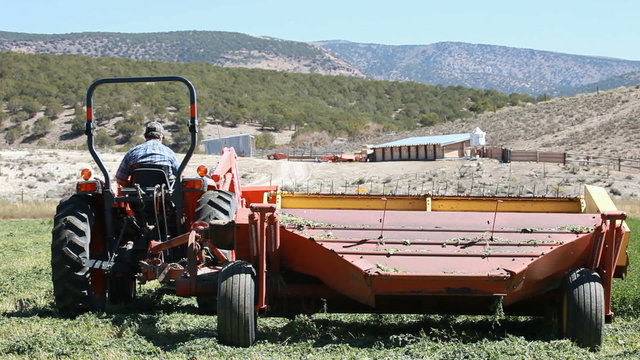 Farm tractor swather start cut P HD 0846