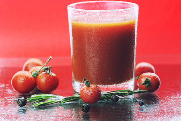 Water drops green and tomatoes