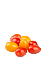 Yellow and red cherry tomatoes on white background