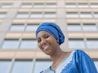 Afro beauty wearing a traditional headscarf 