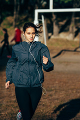  Runner woman jogging outdoors