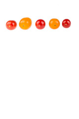 Yellow and red cherry tomatoes on white background