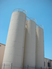 industrial silos with blue sky © jdoms