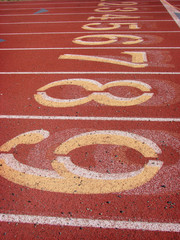 athletic running track with numbered lanes