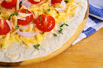 Flat tortilla with cheese and vegetables