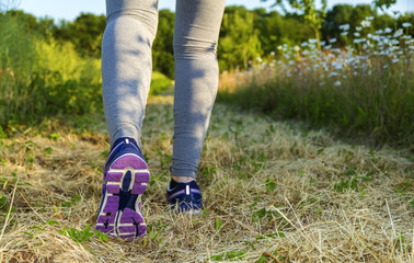 Woman running in a field
