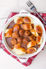 Potato dumplings with meat meatballs.