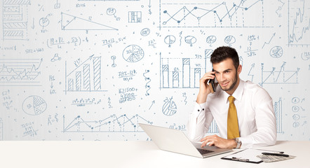 Businessman with diagram background