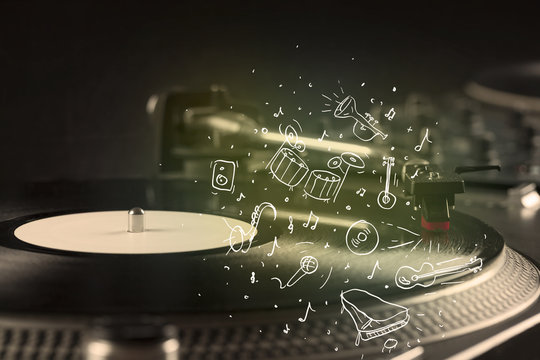 Turntable playing classical music with icon drawn instruments