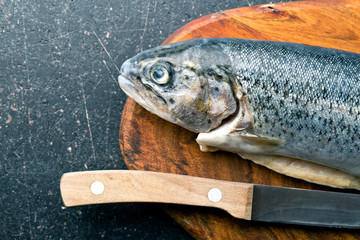 the gutted trout on kitchen table