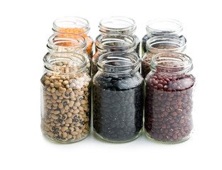 various dried legumes in jars