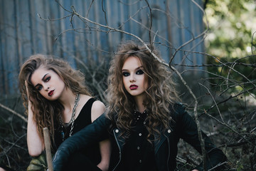 Two vintage witches gathered eve of Halloween