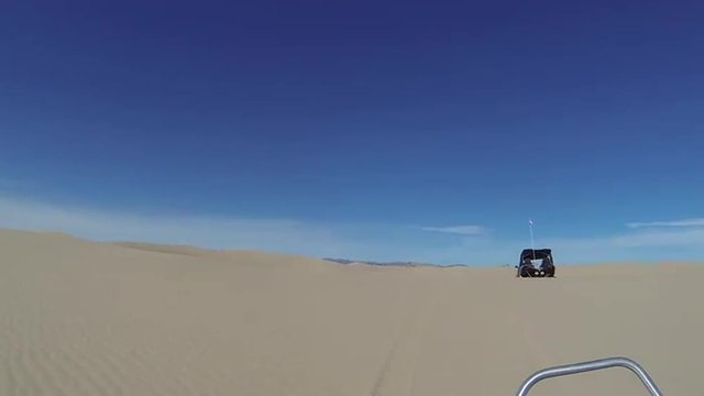 Sand Dunes following another recreational vehicle speed HD 340