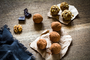 Chocolate truffles on wooden background