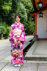 Young woman with Japanese costume at Temple
