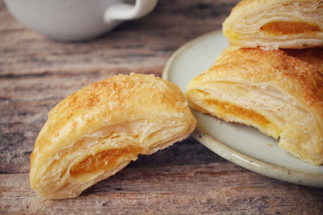 Pineapple pie with coffee cup