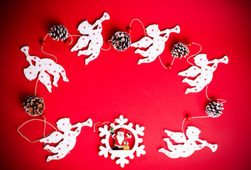 Christmas wooden decorations on a red background