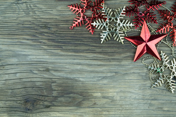 Christmas decorations on old wooden background.