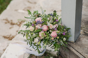 Beautiful bridal bouquet  whith ribbons and lace 