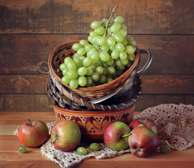 Still life with green grapes and apples