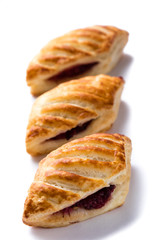 puff pastry with jam on white