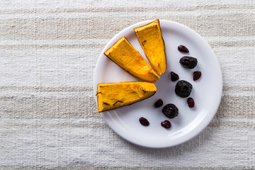 baked pumpkin on white plate