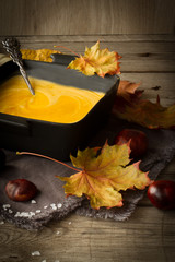 delicious, orange, autumn pumpkin soup. lunch at Halloween