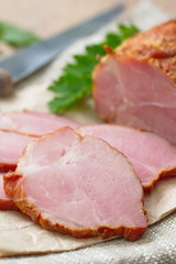 Sliced smoked meat and vegetables