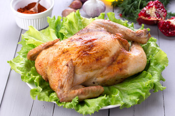 Homemade roasted chicken for festive dinner. 