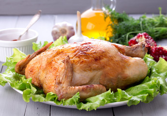 Homemade roasted chicken for festive dinner. 