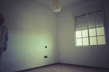 mental disorders, man with red mask and white paper suit