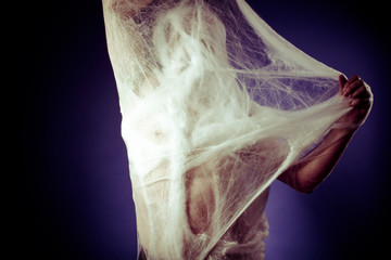 Creepy, mental disorders, man trapped in a giant spider web © Outsiderzone