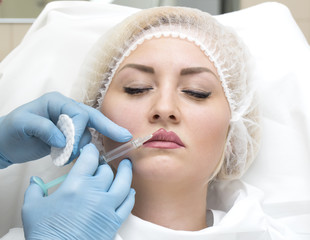 Cosmetic treatment with injection in a clinic