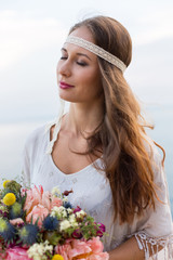 girl with a wedding bouquet boho style