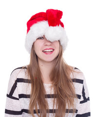 Expressive emotional girl in a Christmas hat on white background