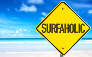 Surfaholic sign with beach background