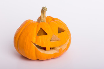 Creepy Halloween Pumpkin with candle light in white background