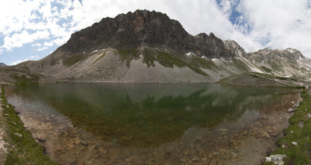 Naklejka premium Alpine nature / The Alps are the highest and most extensive mountain range system that lies entirely in Europe, across Austria, France, Germany, Italy, Liechtenstein, Monaco, Slovenia, and Switzerland
