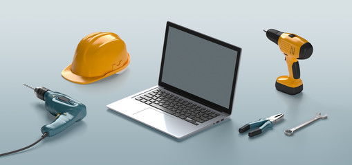 laptop, helmet, drill and construction tools on an isolated back