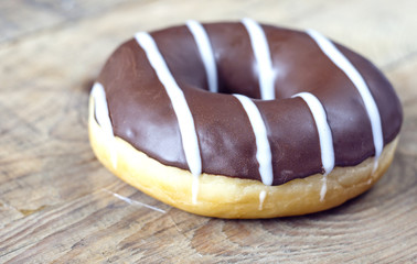 donut lying on a wooden table