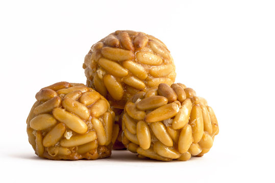 Panellet pine nuts isolated on white