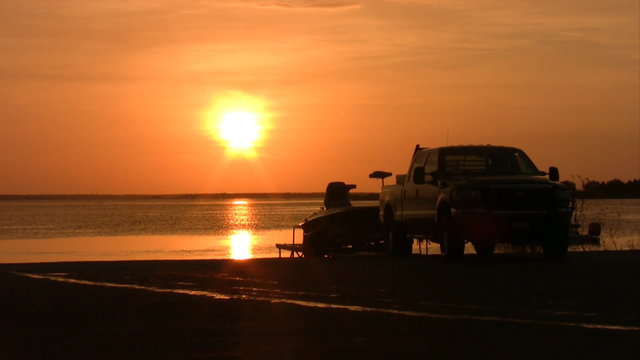 sunset fishing boat launch truck HD