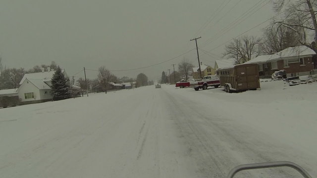 Riding ATV rural town snow storm icy roads POV HD 0225
