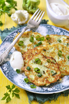 Cauliflower And Broccoli Fritters With Cheese.